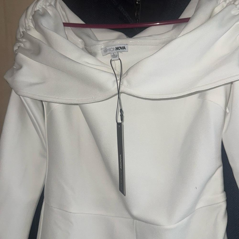 Fashion nova off the shoulder, white bandage jumpsuit size large never worn